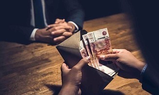 Инженер нефтеперерабатывающего предприятия получил 13 лет колонии за взятки на $360 тыс.
