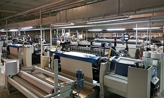 На предприятии в Барановичах постельное белье начали шить роботы